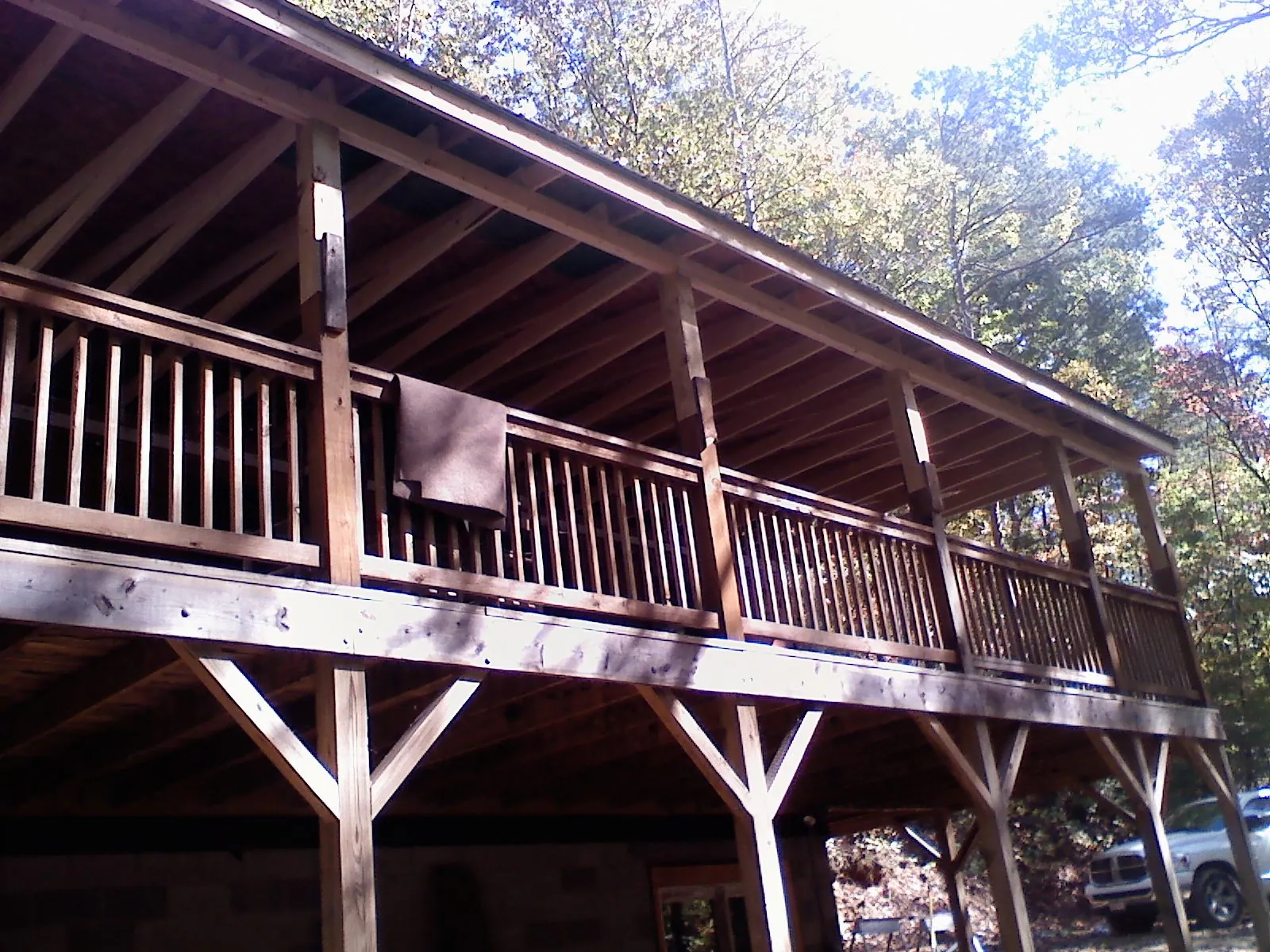 Timber framing under a new elevated porch and deck — Roof Leak Repair in Coldspring by Roofing Brothers